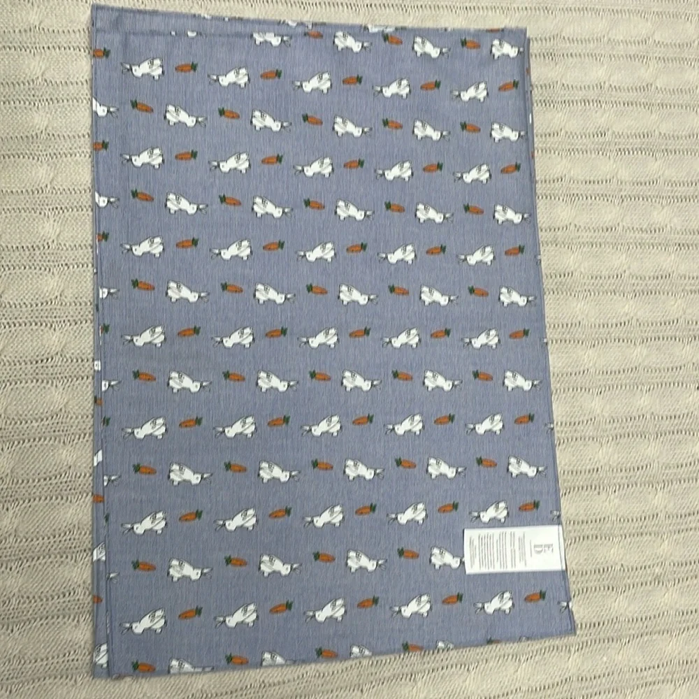 3 NWT Ellen Degeneres bunny/carrot table placemats. 18” x 13” blue background.